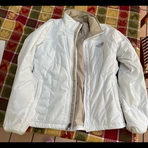 The North Face white jacket with tan inside. Like new.